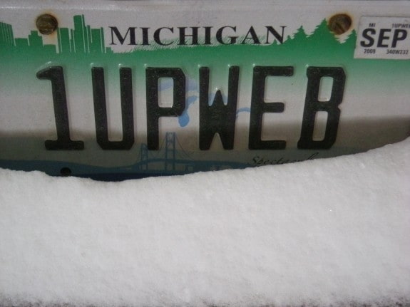 oneupweb license plate