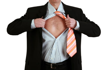 Image showing a man in a suit ripping his shirt off