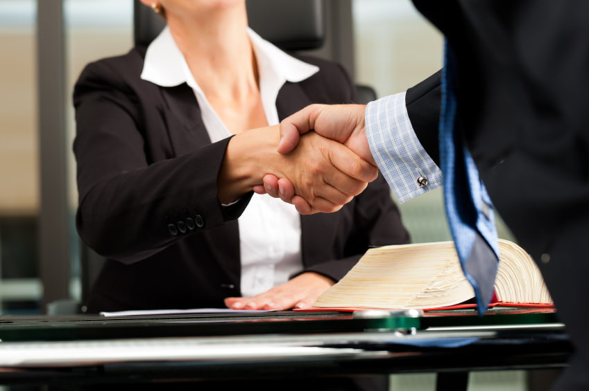 two people shaking hands