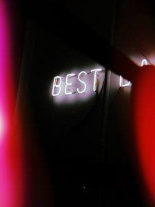 neon sign says best