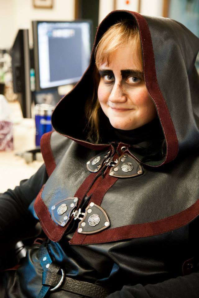 a woman wearing a costume in an office