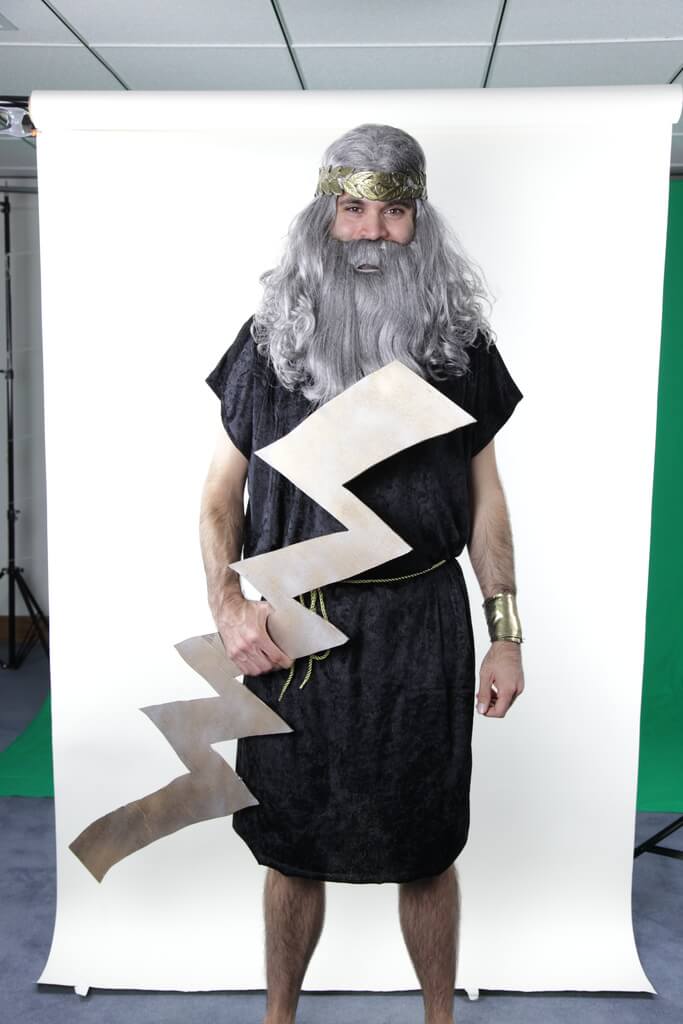 a man wearing a zues costume in an office