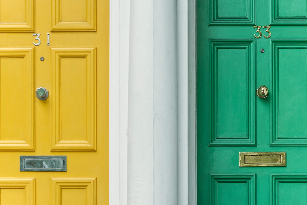 One yellow and one teal door.