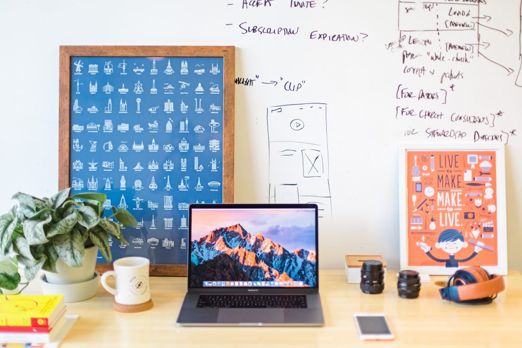 A hip, colorful, and well organized desk.
