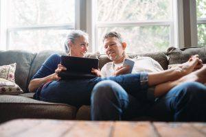 old couple looking at emails