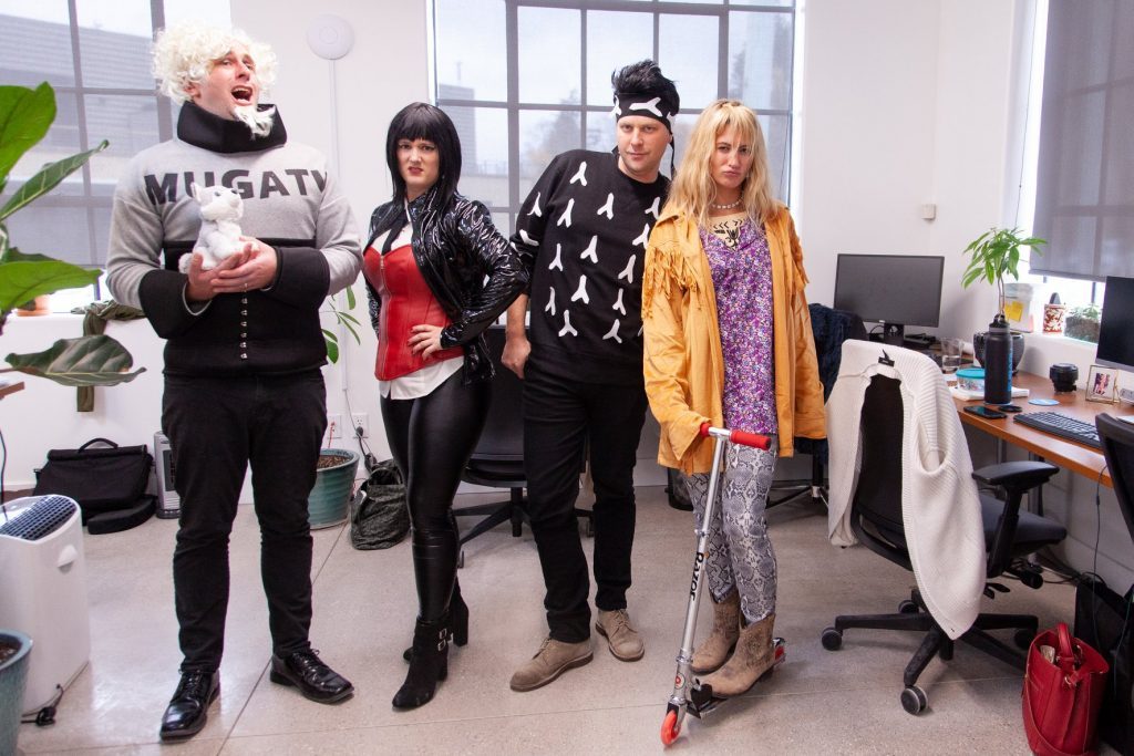 Oneupweb employees dressed up as Zoolander crew for Halloween