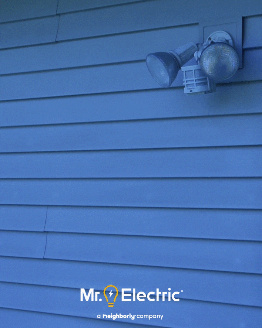 Mr. Electric logo is shown on an image of a house's exterior with a motion sensor lighting system