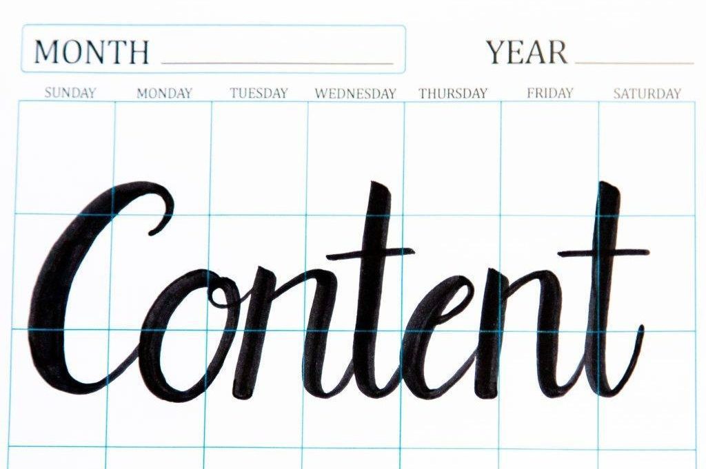 graphic image of a calendar with "content" written on it