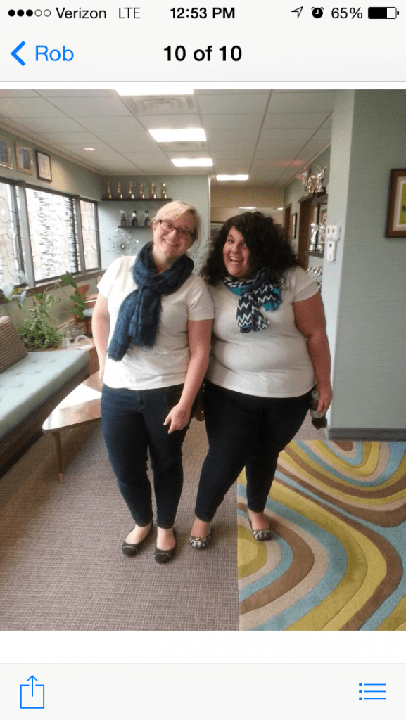 nicole and jess pose in matching outfits at a former oneupweb office