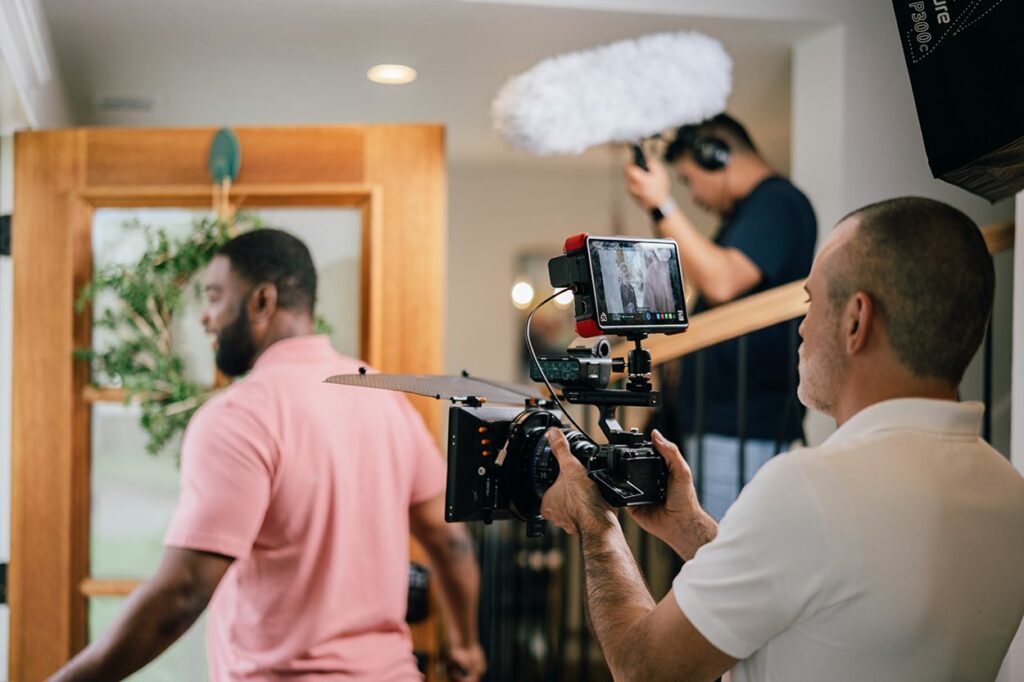 the oneupweb video team captures images on a shoot for five star painting in dallas