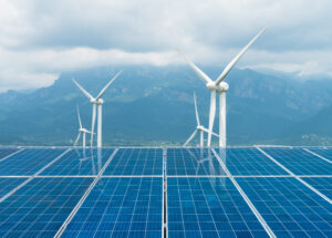 sustainable clean energy, solar panel and wind turbines closeup