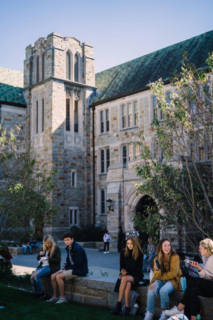 students relax on their college campus